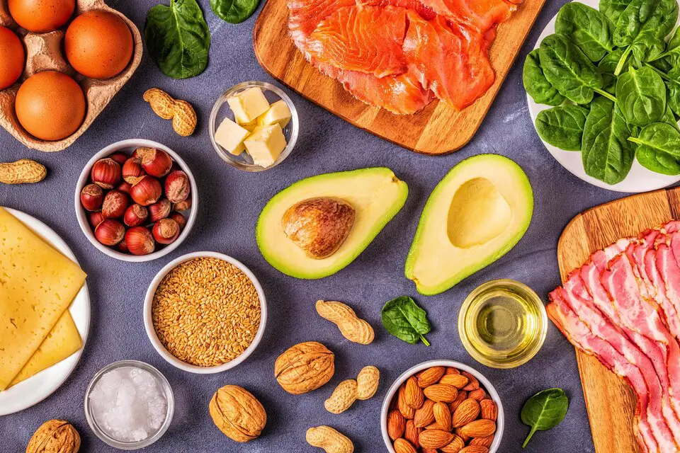 Image featuring various sources of healthy fats, including avocado, nuts, seeds, and olive oil, which are important for a weight gain diet.